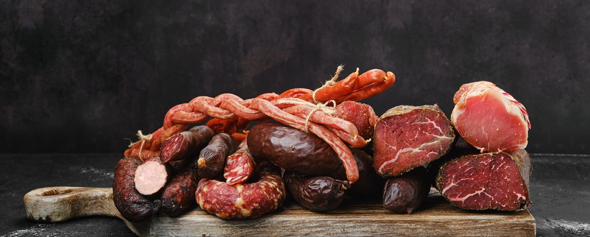 Assortment of pork sand beef ausages, ham and meat