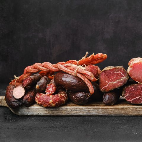 Assortment of pork sand beef ausages, ham and meat